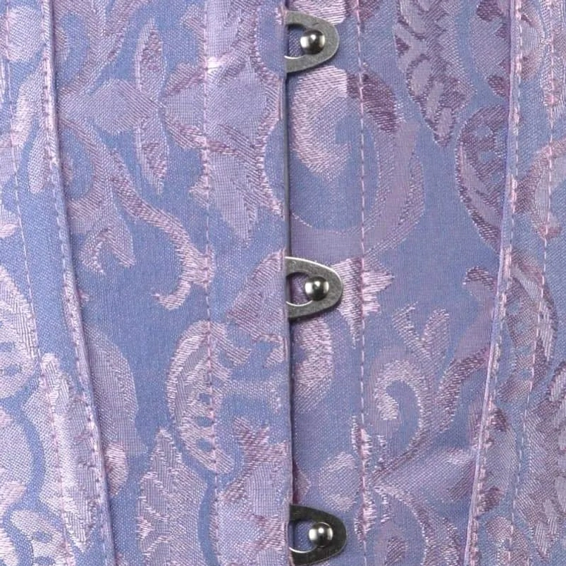 Close-up detail of purple damask jacquard fabric texture and silver hook-and-eye fasteners on steampunk corset