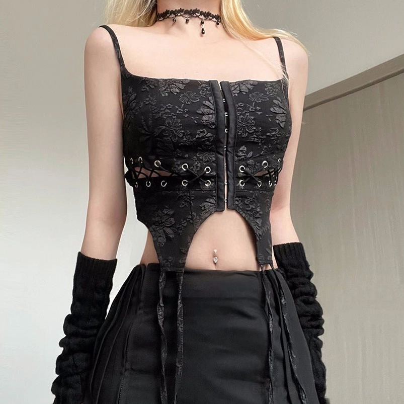 Black steampunk corset with floral jacquard fabric, lace-up cutout detail, and metal eyelets worn by blonde model in front three-quarter view