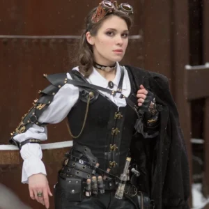 Complete steampunk outfit featuring black overbust corset with corset paired with gothic accessories and rustic industrial background styling