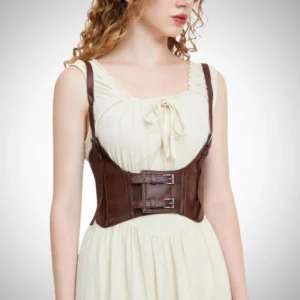 Brown pebbled leather steampunk corset harness with dual industrial buckles and adjustable elastic waist panels, front upper-body view on model