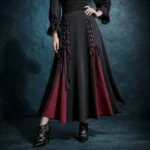 Black and burgundy steampunk A-line skirt with dual corset lace-up detailing, worn on model showing high-waisted silhouette and gothic color-blocking