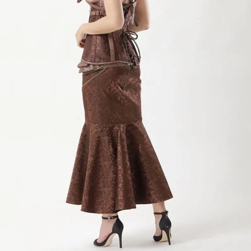 Female model wearing brown steampunk corset and matching mermaid skirt ensemble with strappy heels, side-back pose on white studio background