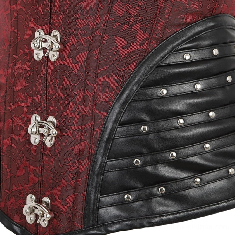 Front detail close-up of metal claw buckles and studded faux leather on red steampunk corset