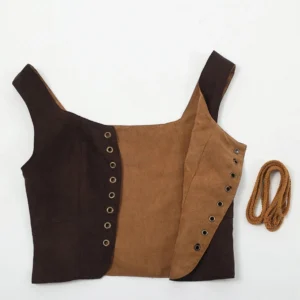Flat lay display of dual-sided steampunk pirate corset vest showing reversible dark and light brown suede, metal eyelet fasteners, and included matching decorative lace rope