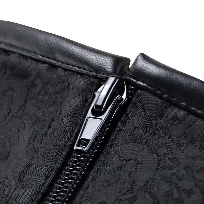 Close-up of steampunk corset zipper, black jacquard fabric, and metal hardware details