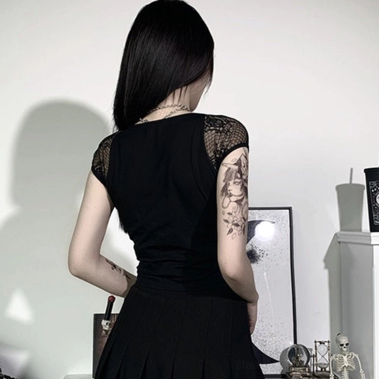 Back view of gothic steampunk cropped lace top with fitted black fabric and fishnet short sleeves