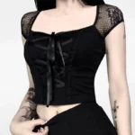 Black gothic steampunk cropped lace top with satin ribbon lace-up front and fishnet cap sleeves, front view on model