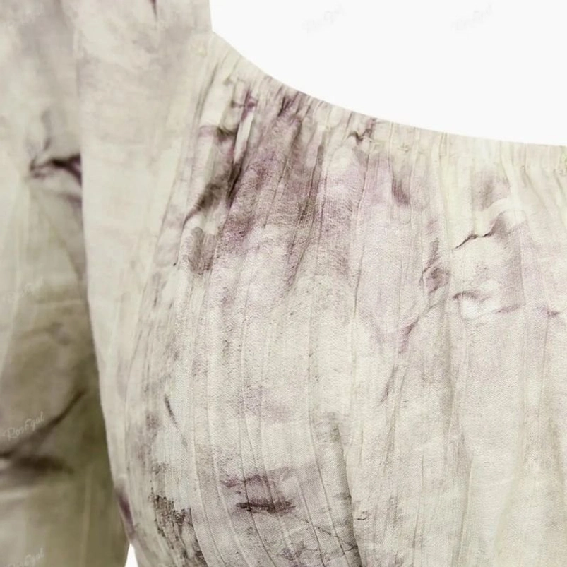 Bodice fabric texture close-up showing crinkled pleated linen-like material with purple ink floral print on beige