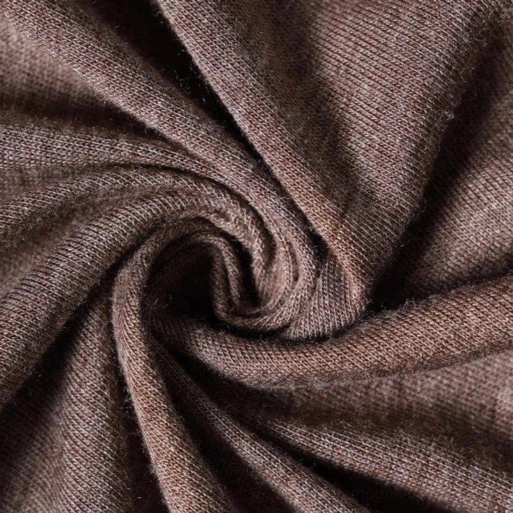Close-up fabric detail of heathered brown knit texture showing soft drapeable material quality