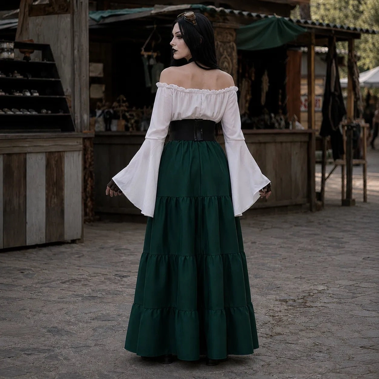 Emerald green Victorian steampunk dress with bell sleeves and layered skirt, rear view showing back detail and full silhouette