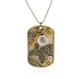 Steampunk dog tag pendant necklace with aged metal finish, mixed silver and gold mechanical gears, embossed butterfly and text decorative elements on white background