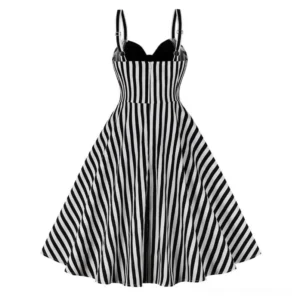 Black and white striped steampunk dress rear view showcasing full-length vertical stripes and flared midi skirt silhouette on white background
