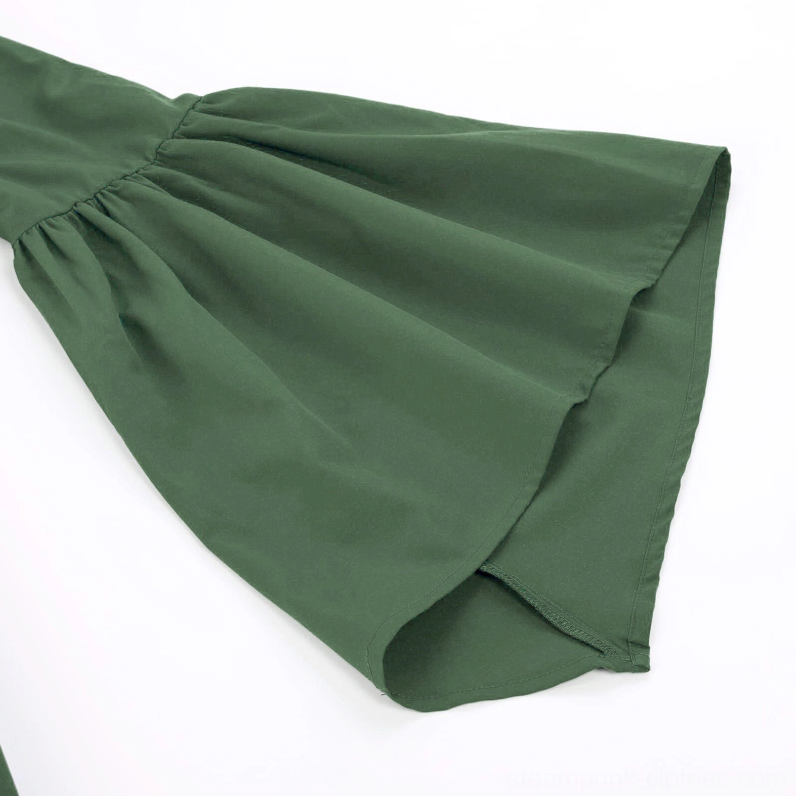 Detail shot of steampunk dress bell sleeve with gathered shoulder cuff and flared design on white background