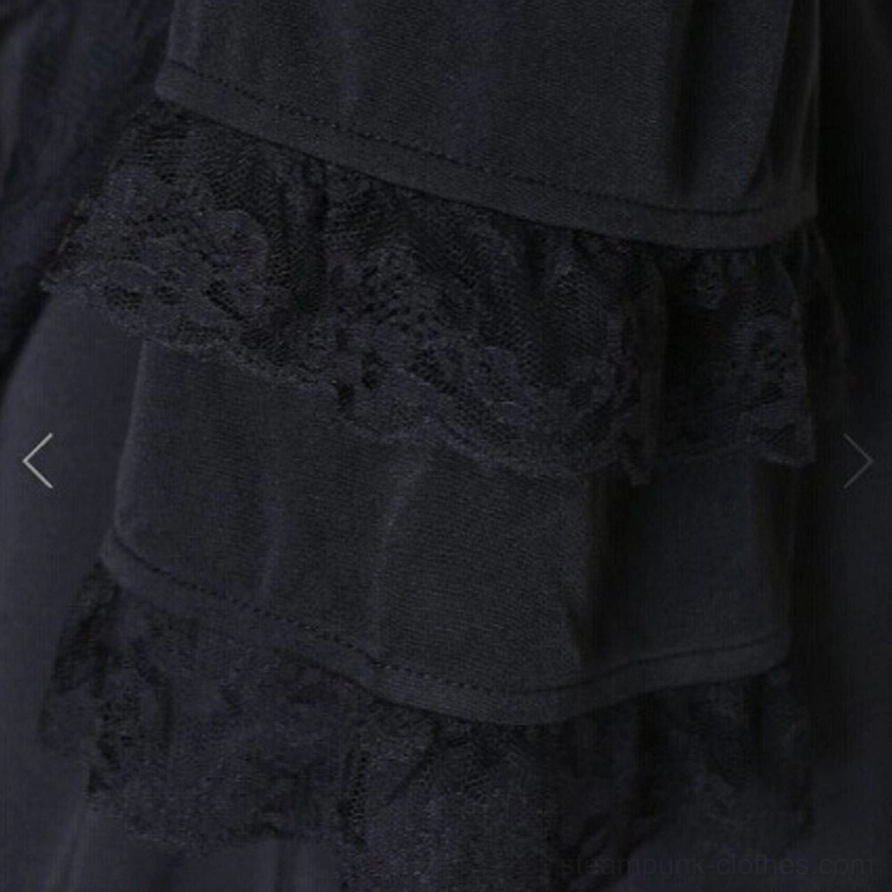 Close-up side view of ruffled lace bell sleeve detail on gothic steampunk dress showing layered floral lace ruffles and black base fabric