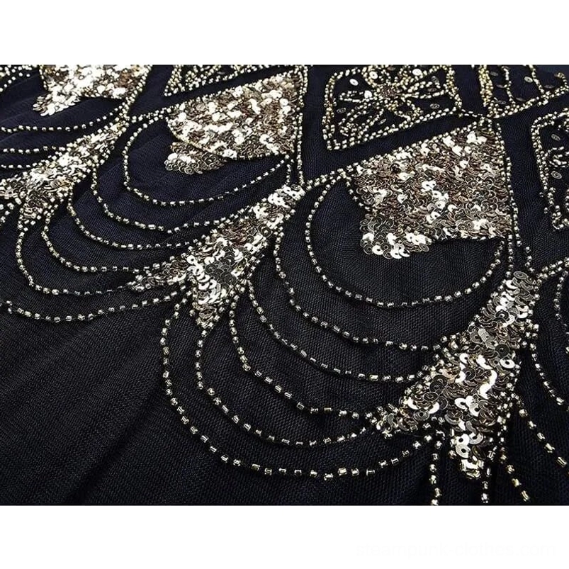 Close-up of Art Deco scroll pattern gold sequins and beaded trim on steampunk dress