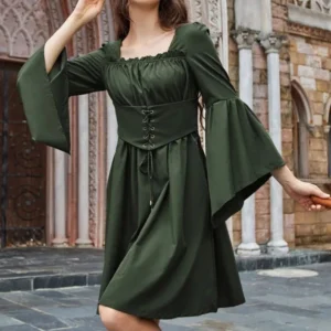 Vintage-inspired green steampunk dress with removable waistband, ruffled square neckline, and flared long sleeves, three-quarter front angle