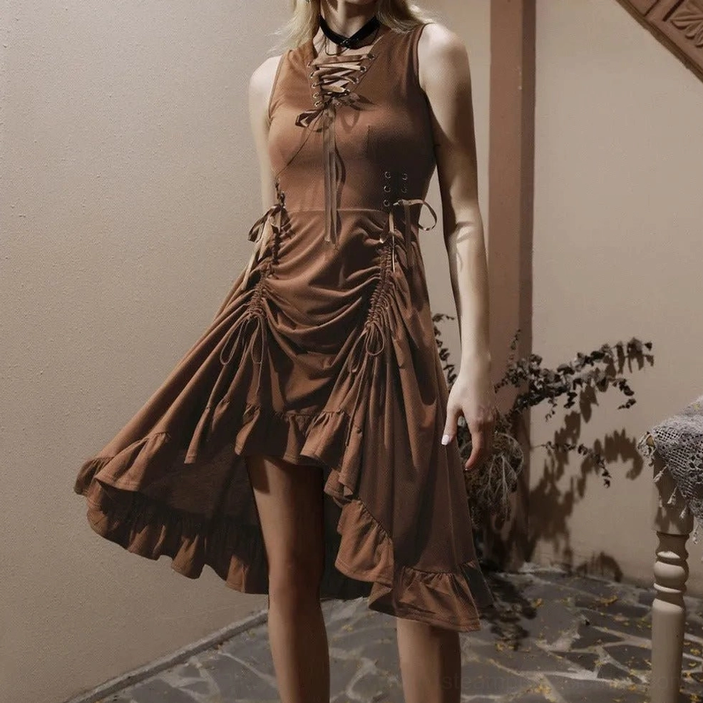 Woman modeling brown steampunk midi dress with lace-up front and side drawstring details in retro stone patio setting