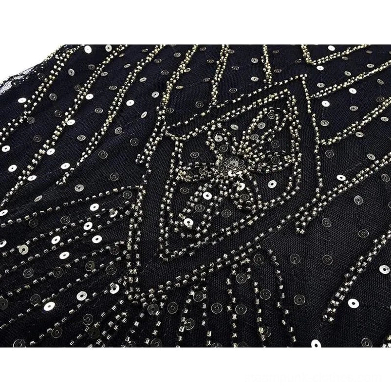 Detailed view of round sequins and beaded floral motifs on black steampunk mermaid dress