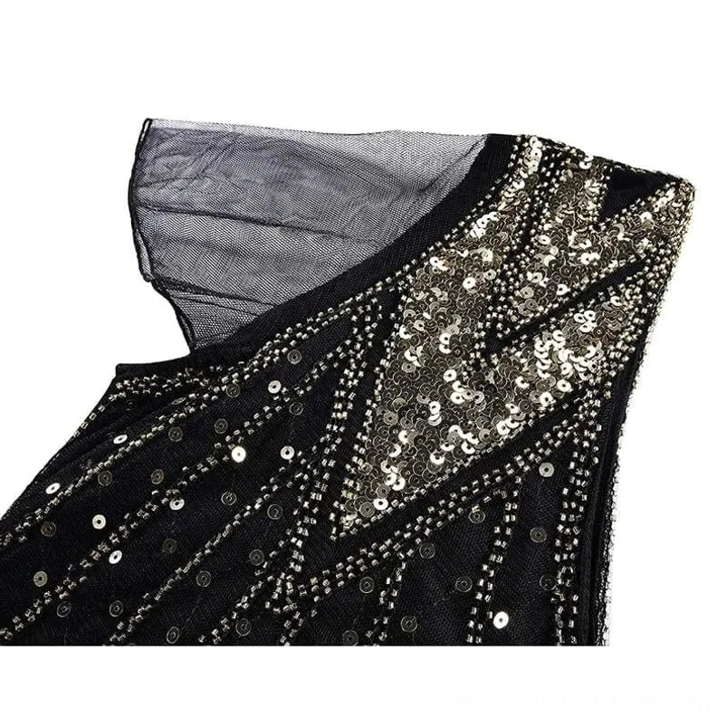 Sheer tulle flutter sleeve with gold beaded shoulder decoration on gothic steampunk dress neckline