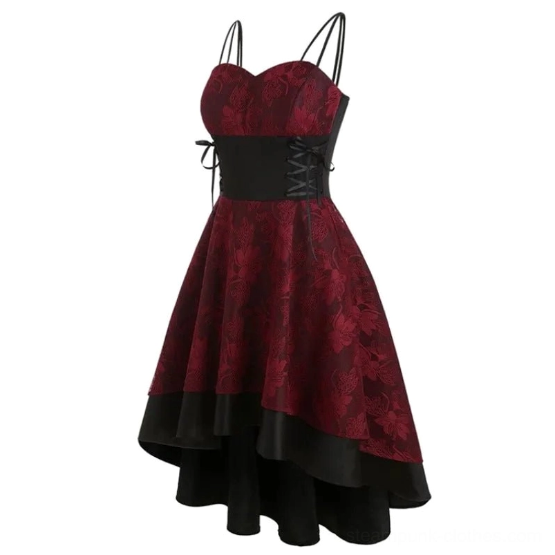 Three-quarter view of steampunk floral dress showing black corset waist lacing, layered black skirt trim, and burgundy floral pattern detail