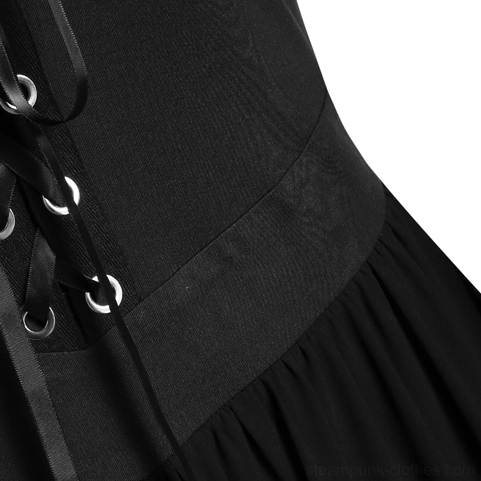 Detail view of dress waist transition featuring wide waistband, pleated chiffon skirt overlay, and decorative lace eyelet trim embellishment