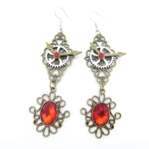 Red gemstone steampunk drop earrings with bronze alloy gears and clock pointer details, front view