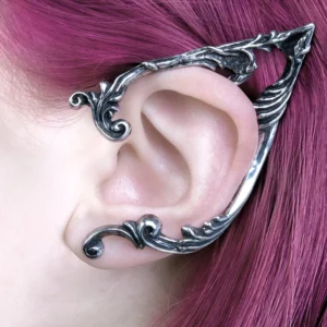 Steampunk elf ear cuff with antiqued silver scroll vine carving worn on ear with magenta pink hair background showing side close-up detail