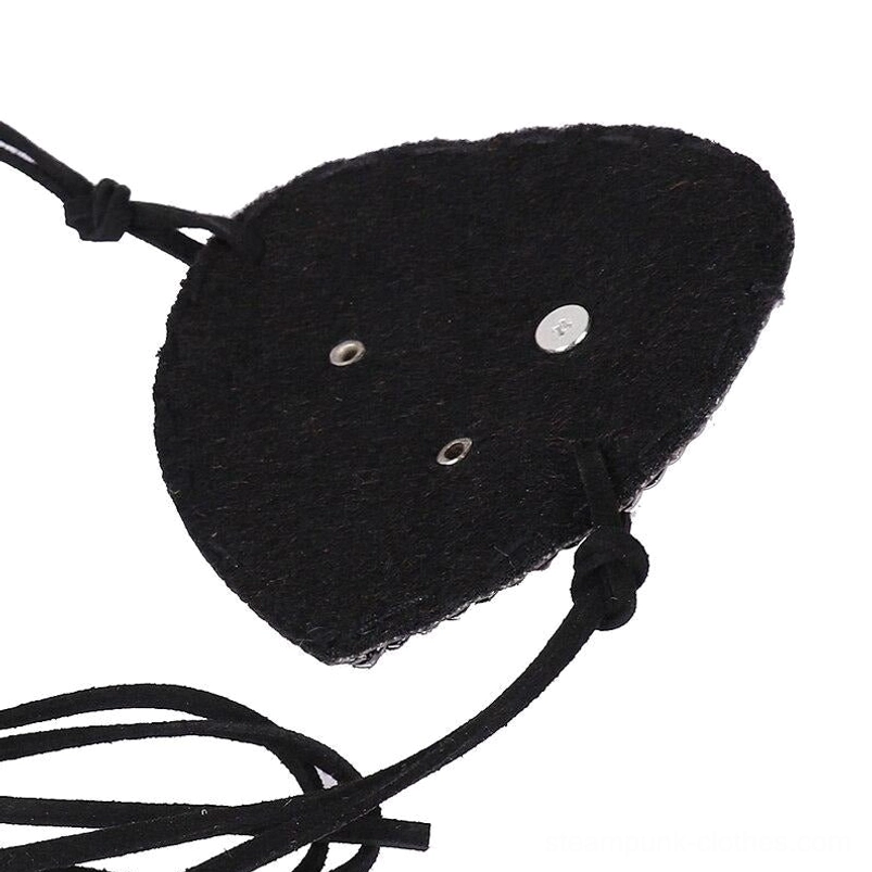 Back view of steampunk eye patch displaying black fuzzy fabric lining, metal eyelets, secure fastener, and knotted adjustable suede strap