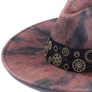 Close-up detail of steampunk fedora showing vintage brass gear ornaments, felt texture, and black adjustable hat strap