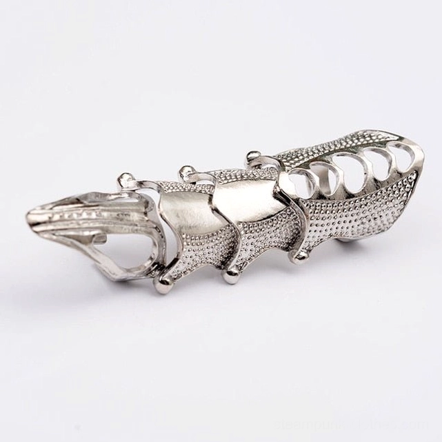 Silver steampunk finger armor with matte finish showing perforated hollow articulated joints and studded decorative dots on clean white background