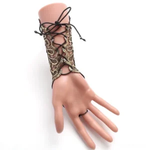 Black lace fingerless steampunk glove front view on mannequin hand, displaying lace-up straps and golden embroidered floral patterns