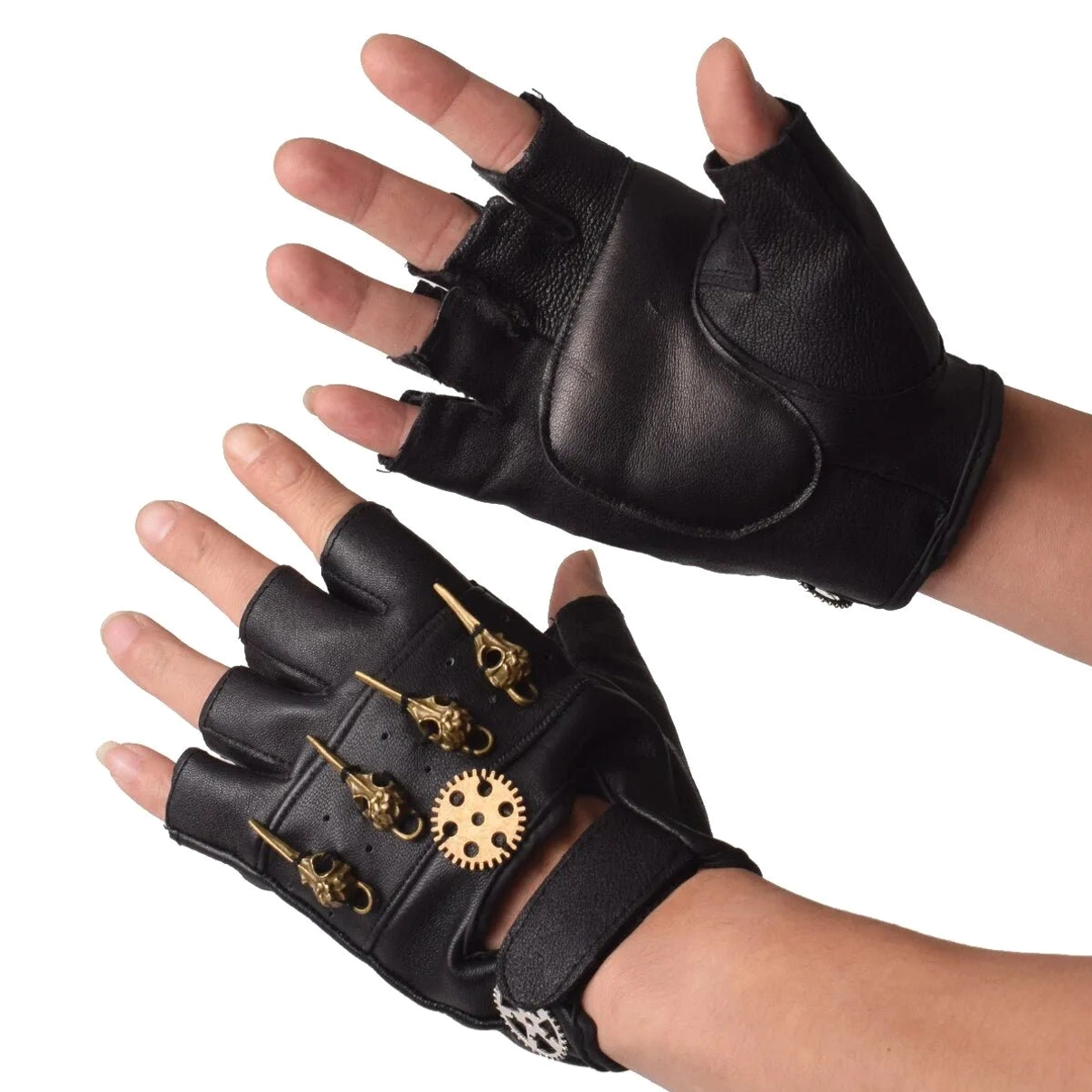 Front view of black fingerless steampunk leather gloves with brass skull and gear ornaments, spread fingers display on white background