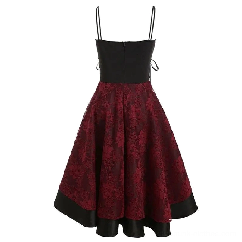 Back view of retro steampunk floral dress featuring solid black back panel, hidden zipper, and burgundy embossed floral skirt