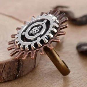 Steampunk flower gear ring with dual-tone copper and silver finish featuring multi-layer mechanical petals and interlocking gears, displayed on wooden surface