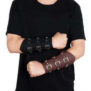 Adjustable steampunk wrist armor pair displayed on male torso wearing black casual t-shirt, front studio view showing both black and brown color variants and multi-buckle strap system from front perspective