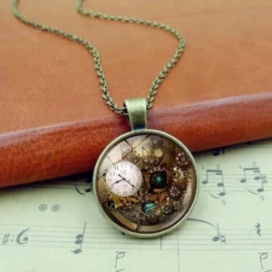 Steampunk gear clock pendant necklace in bronze tone with glass dome, displayed on sheet music and brown leather background