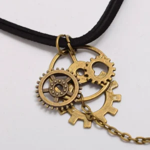 Close-up detail of steampunk choker pendant showing layered vintage brass gears and metal chain attachment - macro view