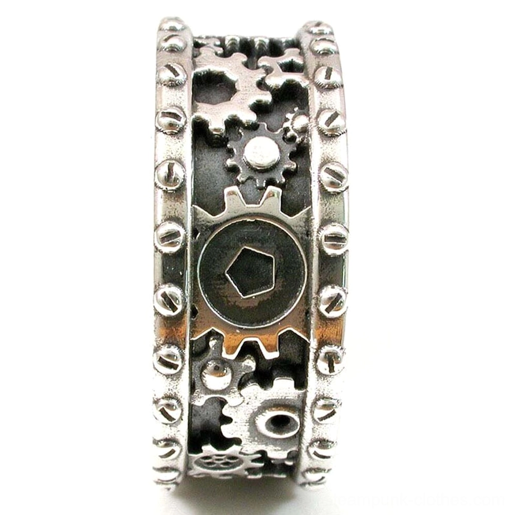 Steampunk carved gear ring front vertical close-up featuring central hexagonal gear accent, hollowed gear motifs, studded ring border, and silver-black color contrast on white background