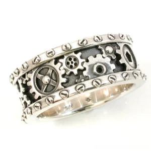 Steampunk gear spinner ring side oblique angle showcasing multi-layer gear design, polished silver finish, 925 stamped inner band, and rivet-decorated rim on white background