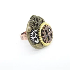 Side profile of industrial steampunk cog ring displaying multi-layer gear architecture and band structure with mixed metal finish