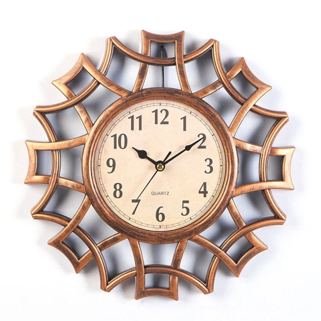 Copper bronze steampunk geometric wall clock with aged off-white face and industrial-inspired hollow web frame design