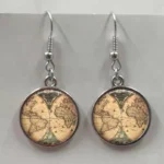 Steampunk globe drop earrings featuring antique world map design in glass domes with silver-toned zinc alloy hardware, close-up product shot