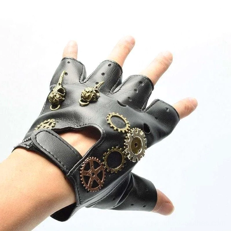 Steampunk fingerless gloves on human hand showing vintage brass gear ornaments and black leather