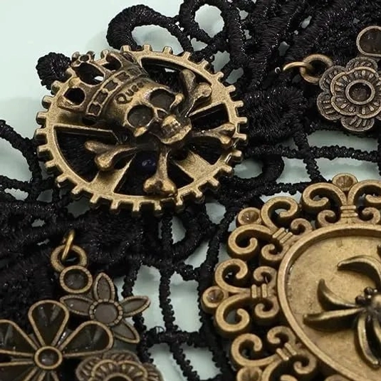 steampunk gloves bronze metal details close-up macro shot featuring skull gear and flower-shaped ornaments
