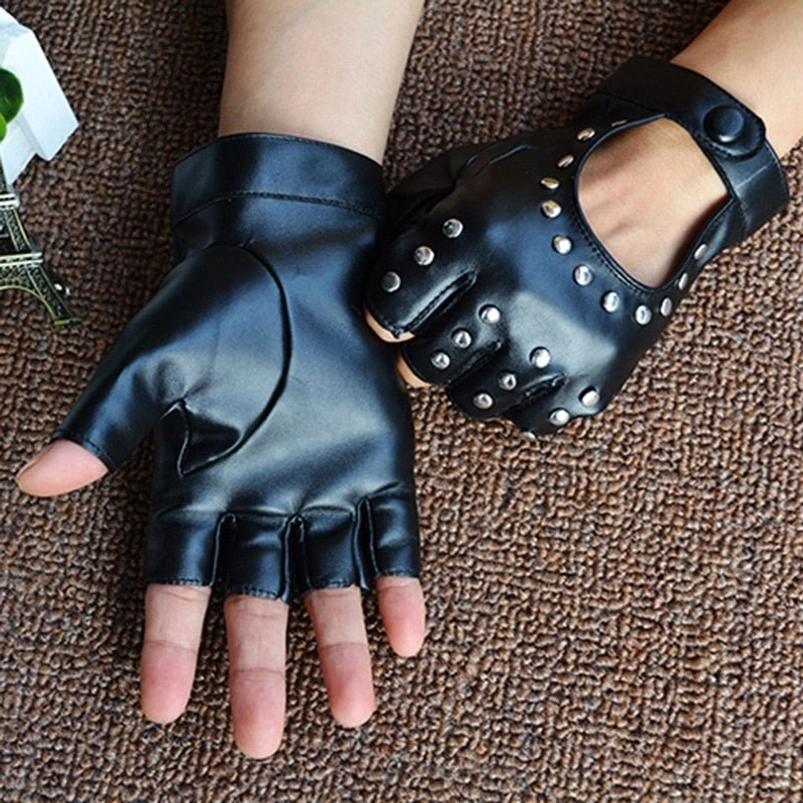 Black studded fingerless leather gloves displaying on two hands, overhead flat lay, smooth matte finish, wrist snap button closure, carpet background