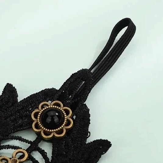 steampunk spider gloves side view detail showing black lace fabric with bronze flower trim and black beading