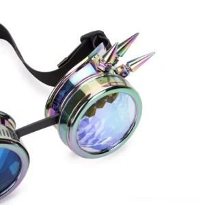 close-up side view of single steampunk spiked goggle featuring faceted prism lens and iridescent metal finish with spike studs