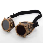 Steampunk aviator goggles with copper bronze frame, gold rivets, and dark tinted lenses - front flat lay studio view