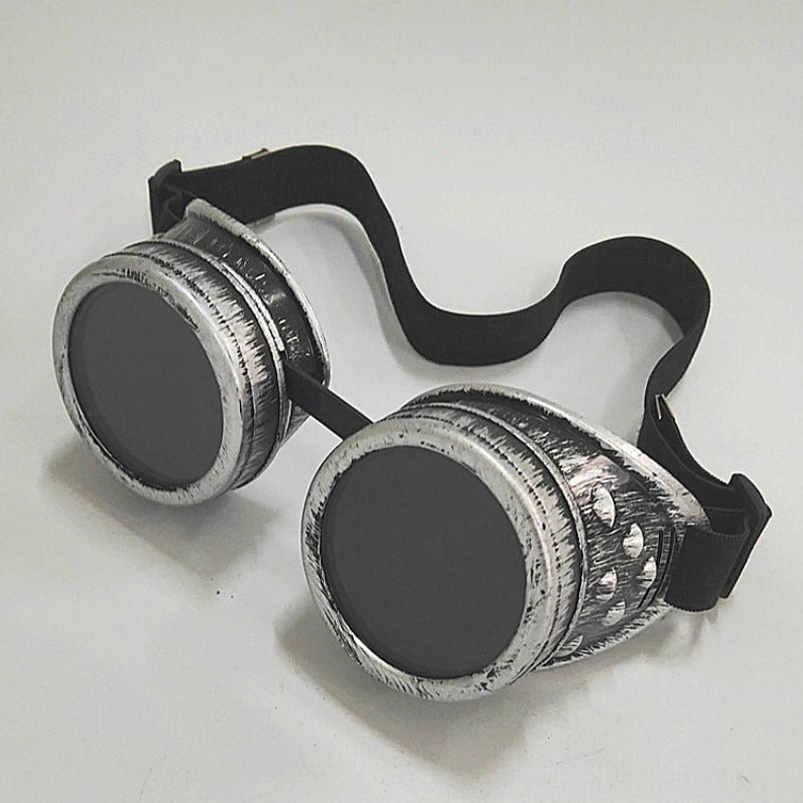 Silver steampunk goggles with distressed metal texture and prominent rivet details, flat lay white background