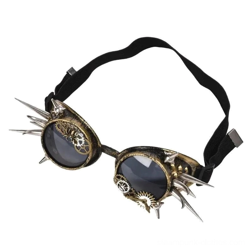 Vintage-inspired steampunk eyewear with aged brass metal frame and silver spike accents, three-quarter angle view showing complete spike arrangement and gear details